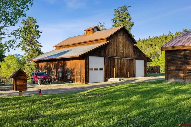 a view of an outdoor swimming pool and mountain view