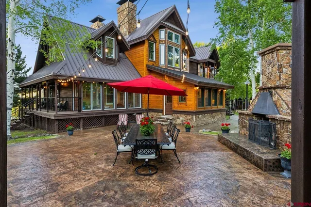 an outdoor space with patio and a garden