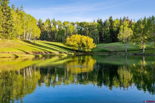 a view of a lake with mountains in the background