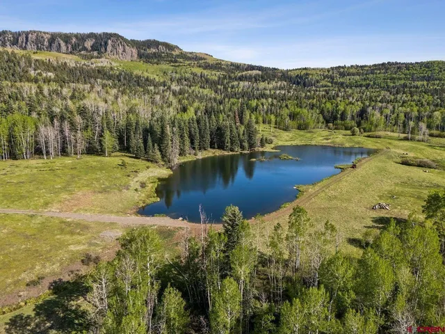 a view of a lake with a mountain in the background