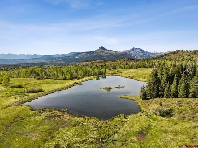 a view of a lake with a mountain