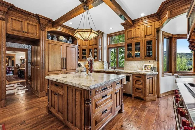 a kitchen that has a lot of cabinets in it
