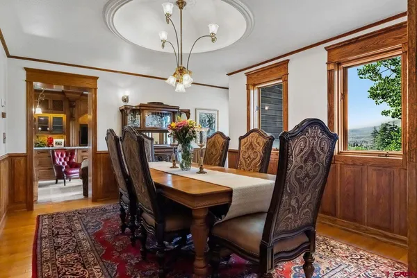 a bed room with a bed and a chair