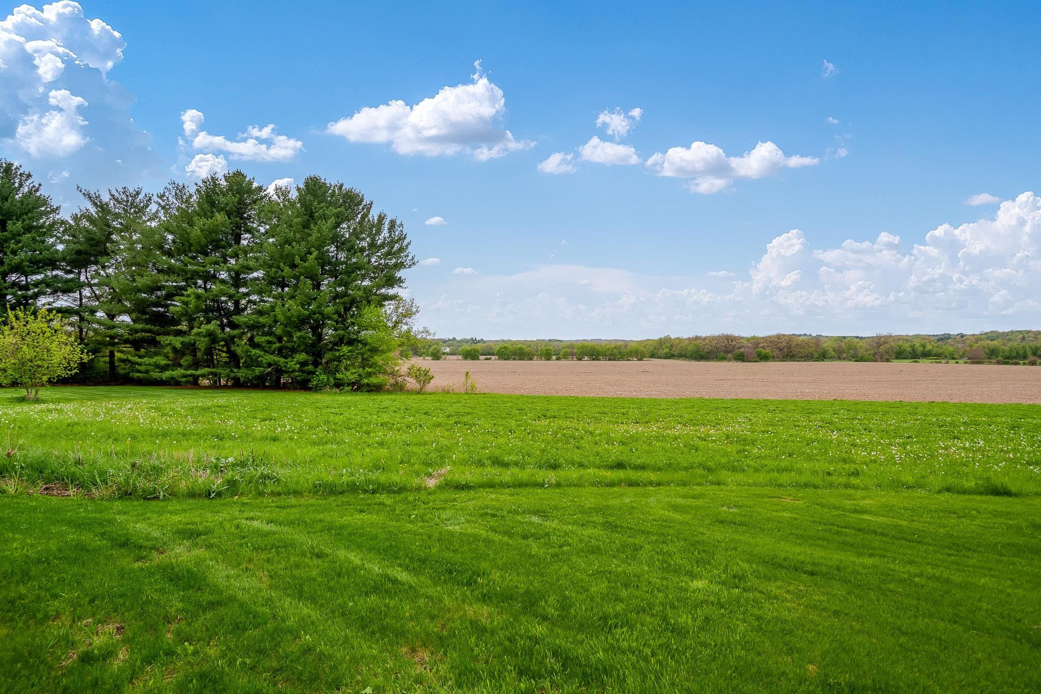 10562 Town Hall Road Belvidere, IL 61008 - Photo 61 of 72 a view of a lake and green space