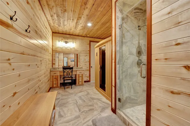 a view of a hallway with a furniture