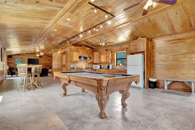 a room with lots of furniture and clutter