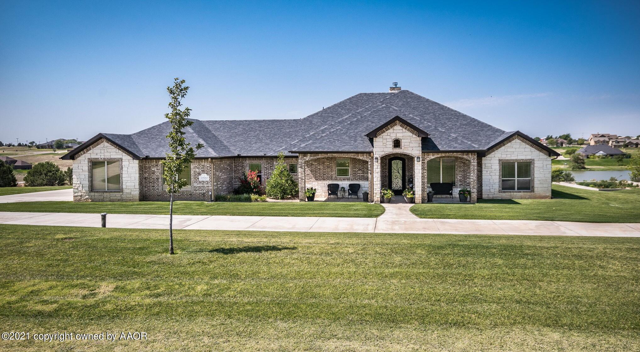 17500 Spring Lake Drive Canyon, TX 79015 - Photo 1 of 49 a front view of a house with a yard