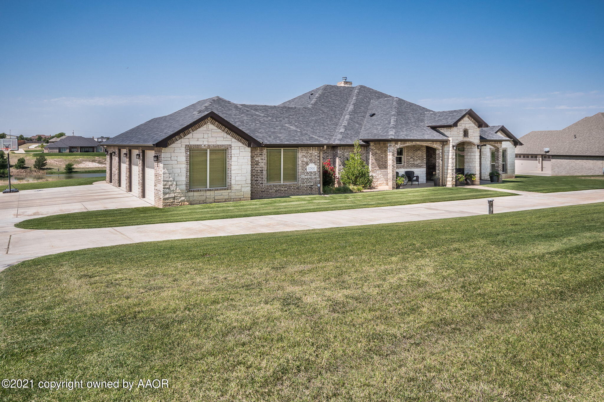 17500 Spring Lake Drive Canyon, TX 79015 - Photo 2 of 49 a front view of a house with a yard