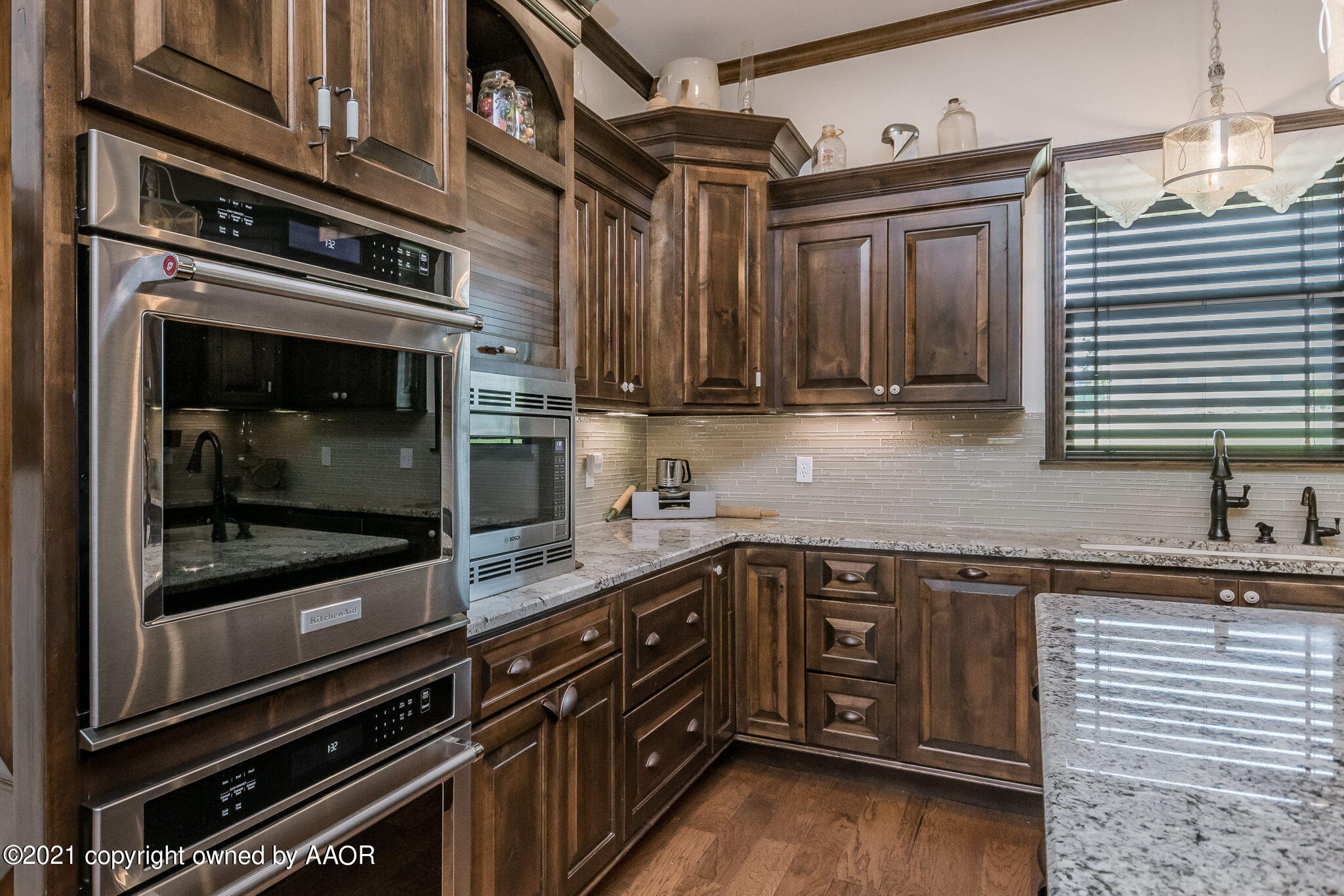 17500 Spring Lake Drive Canyon, TX 79015 - Photo 12 of 49 a kitchen with a sink stove and cabinets