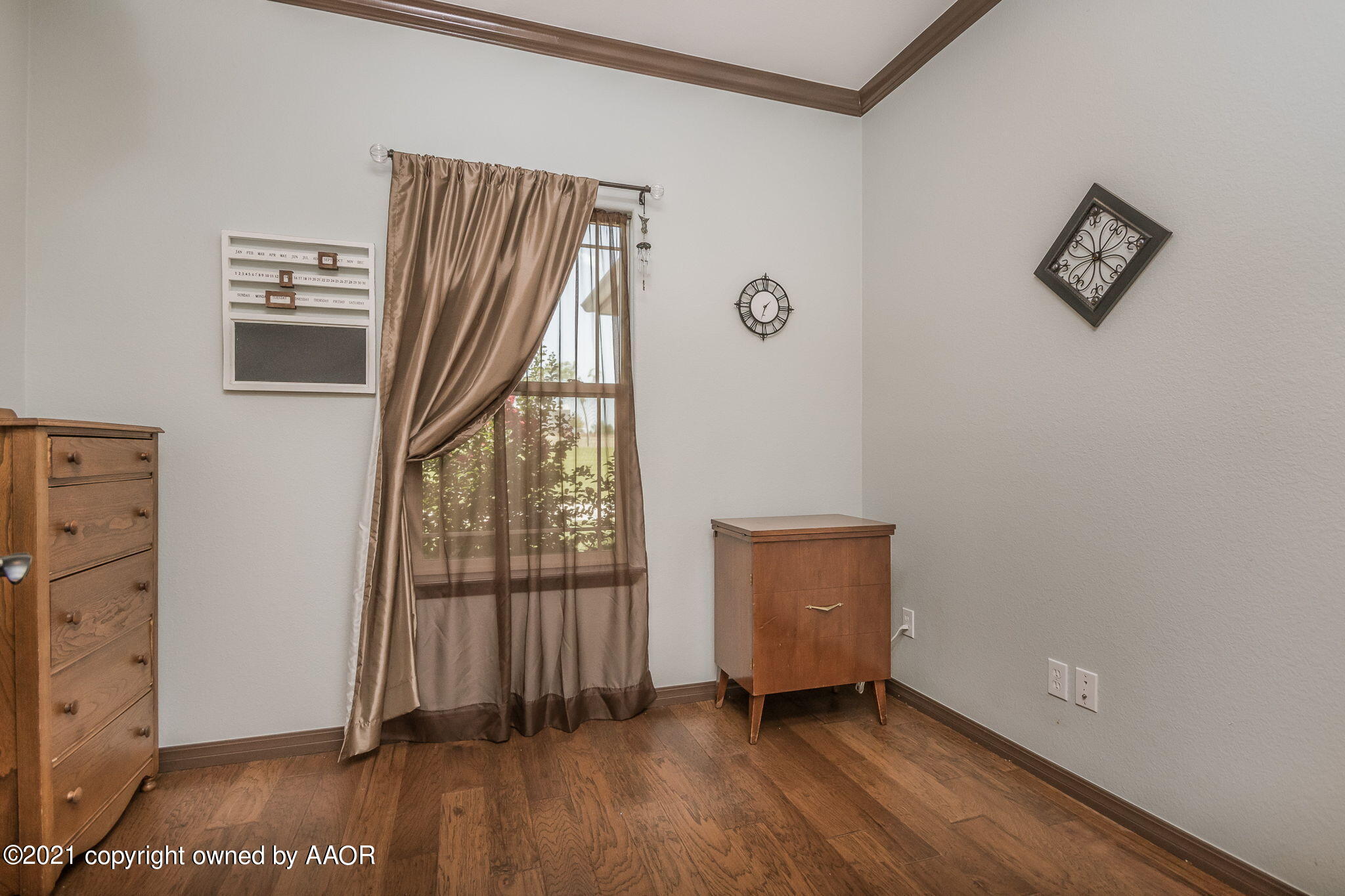 17500 Spring Lake Drive Canyon, TX 79015 - Photo 22 of 49 a view of room with window and wooden floor