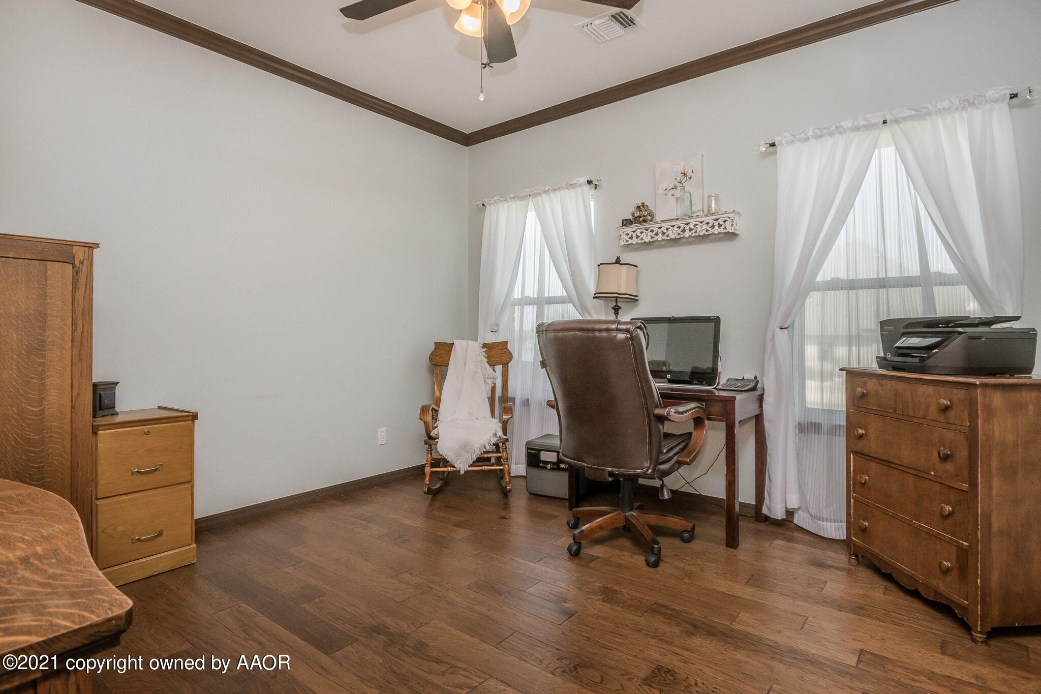17500 Spring Lake Drive Canyon, TX 79015 - Photo 24 of 49 a view of a workspace with furniture and a window