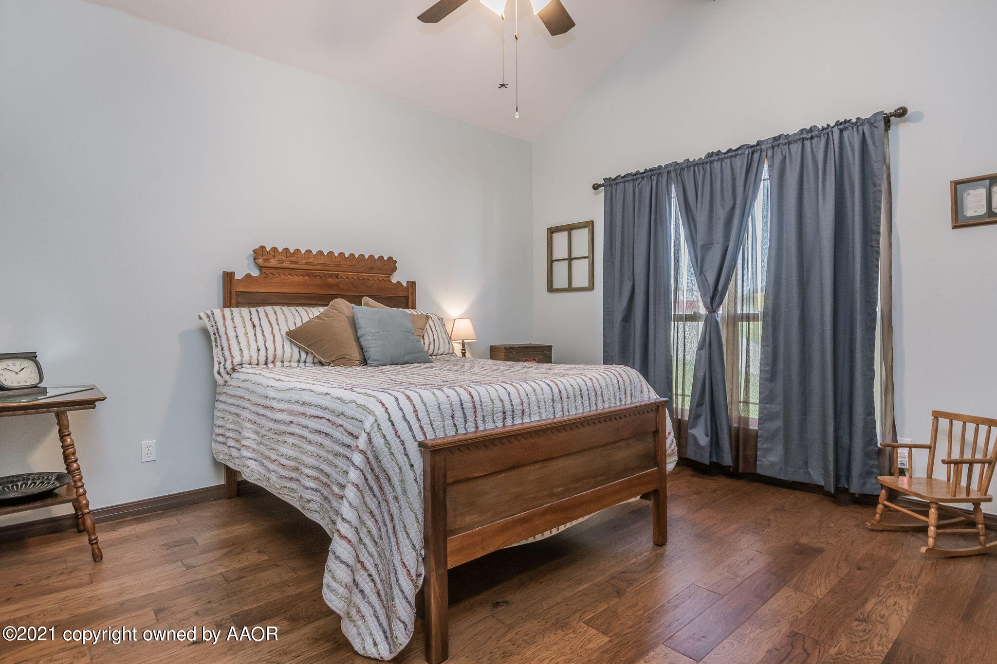 17500 Spring Lake Drive Canyon, TX 79015 - Photo 26 of 49 a bedroom with a bed and a chair