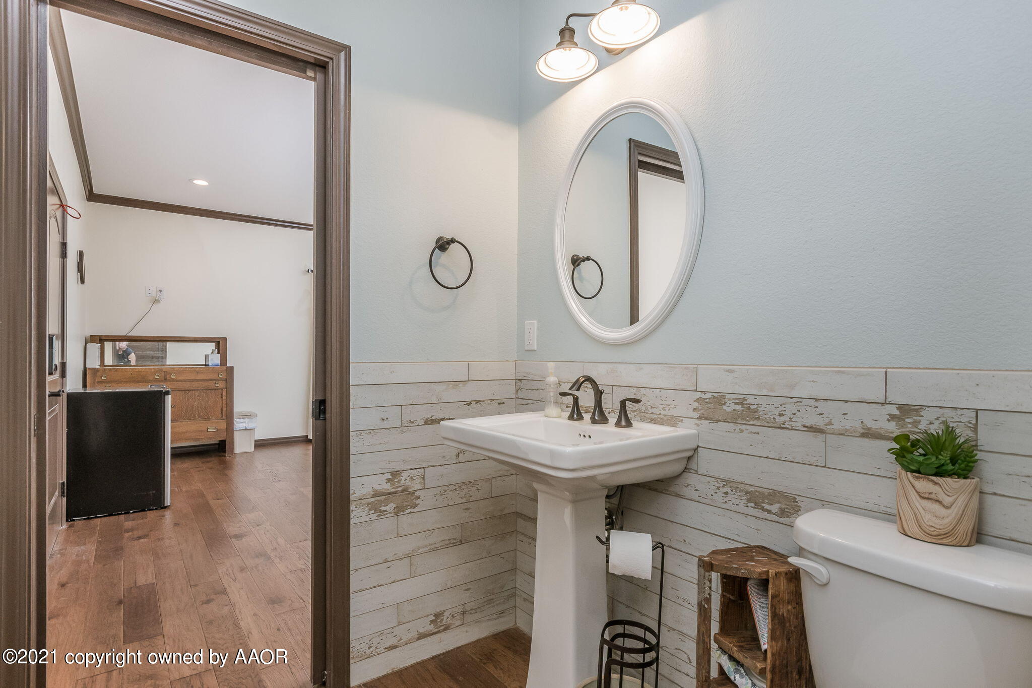 17500 Spring Lake Drive Canyon, TX 79015 - Photo 28 of 49 a bathroom with a sink and a mirror