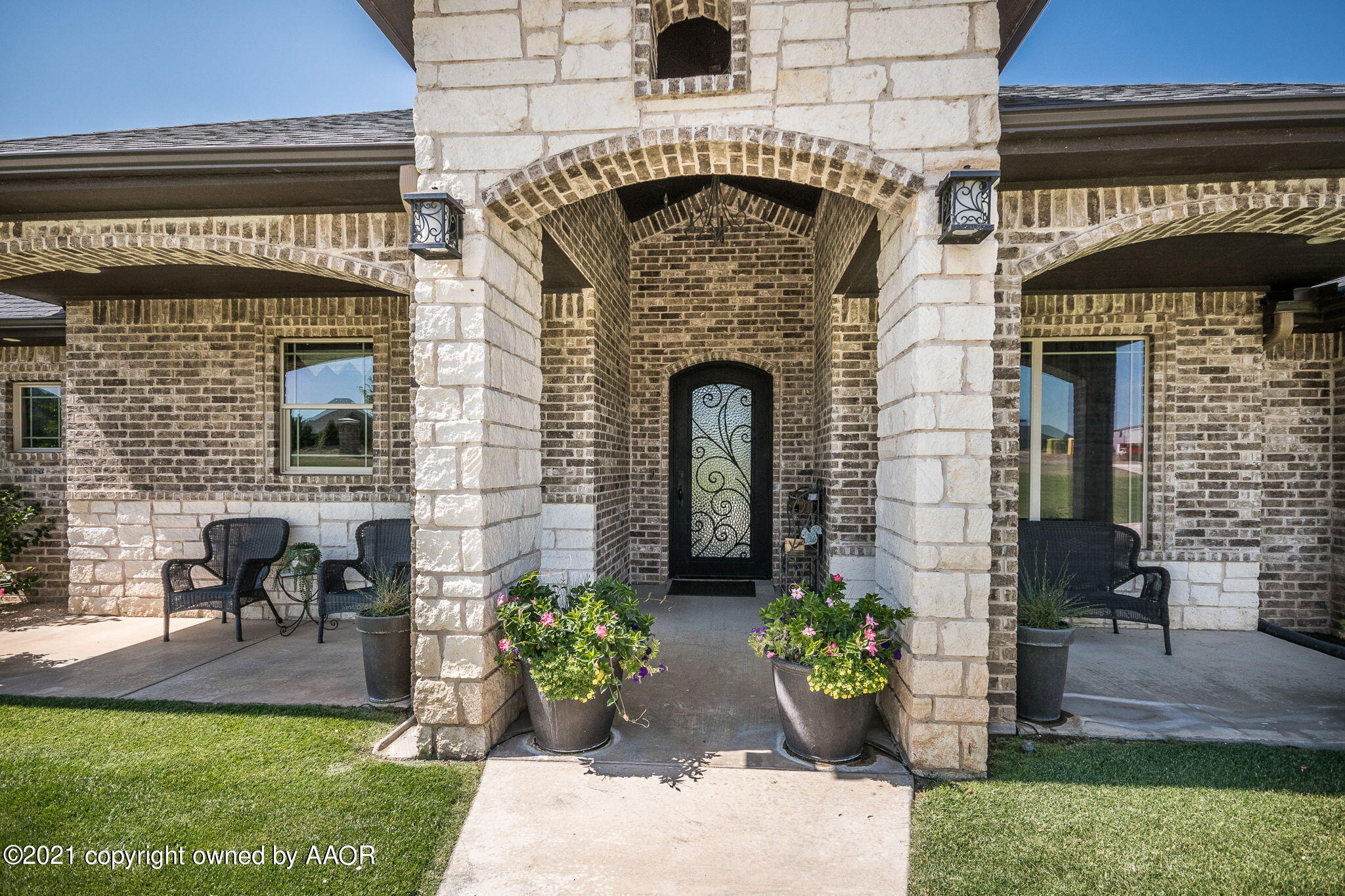 17500 Spring Lake Drive Canyon, TX 79015 - Photo 4 of 49 a front view of a house with outdoor seating