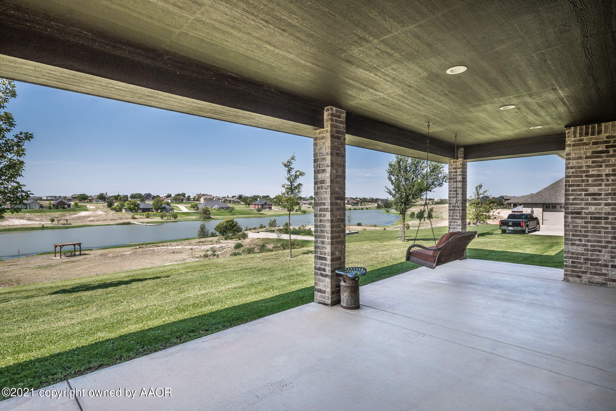 17500 Spring Lake Drive Canyon, TX 79015 - Photo 36 of 49 a view of a house with a big yard potted plants and large tree