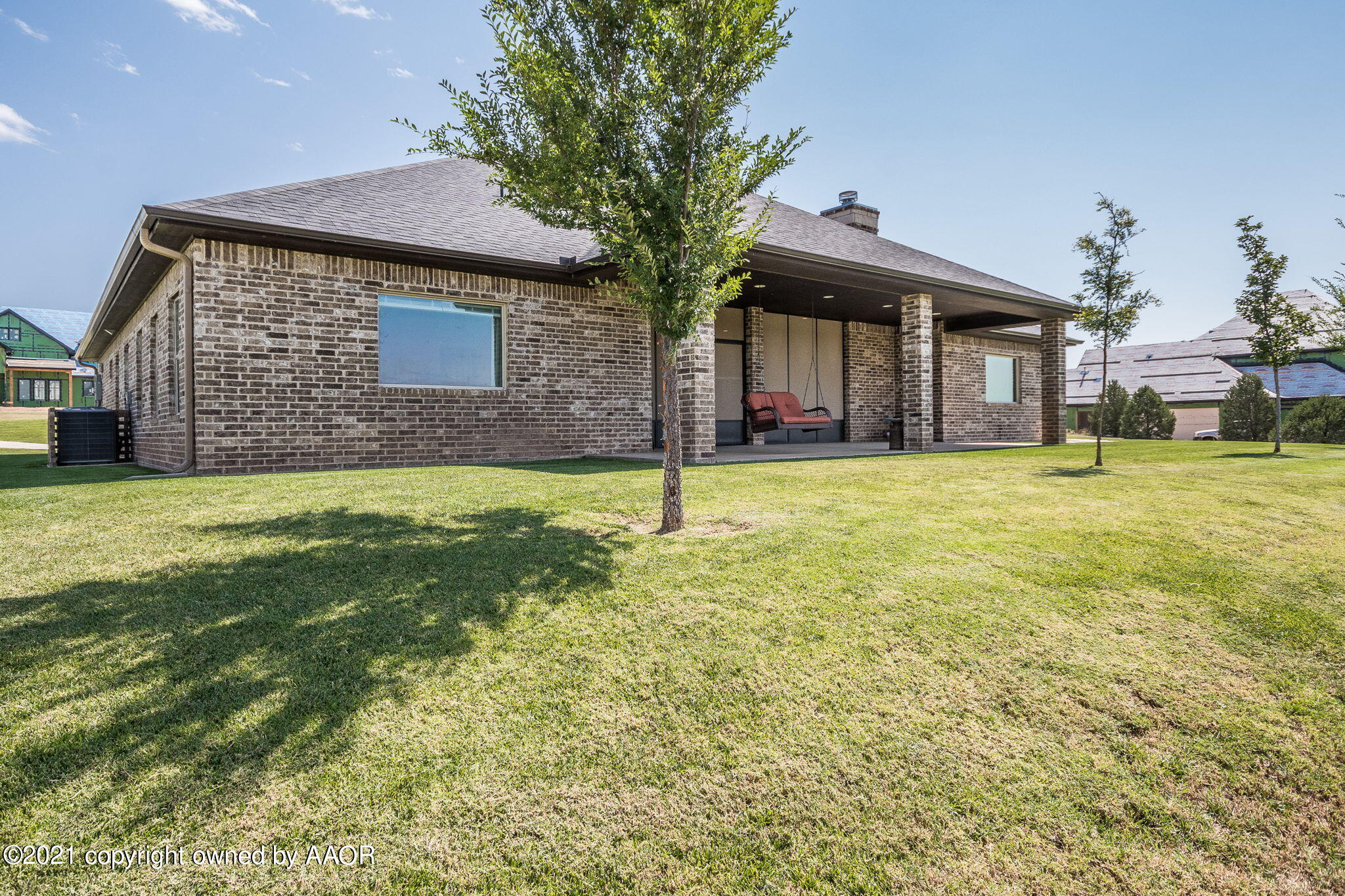 17500 Spring Lake Drive Canyon, TX 79015 - Photo 39 of 49 a view of a house with a yard and garage