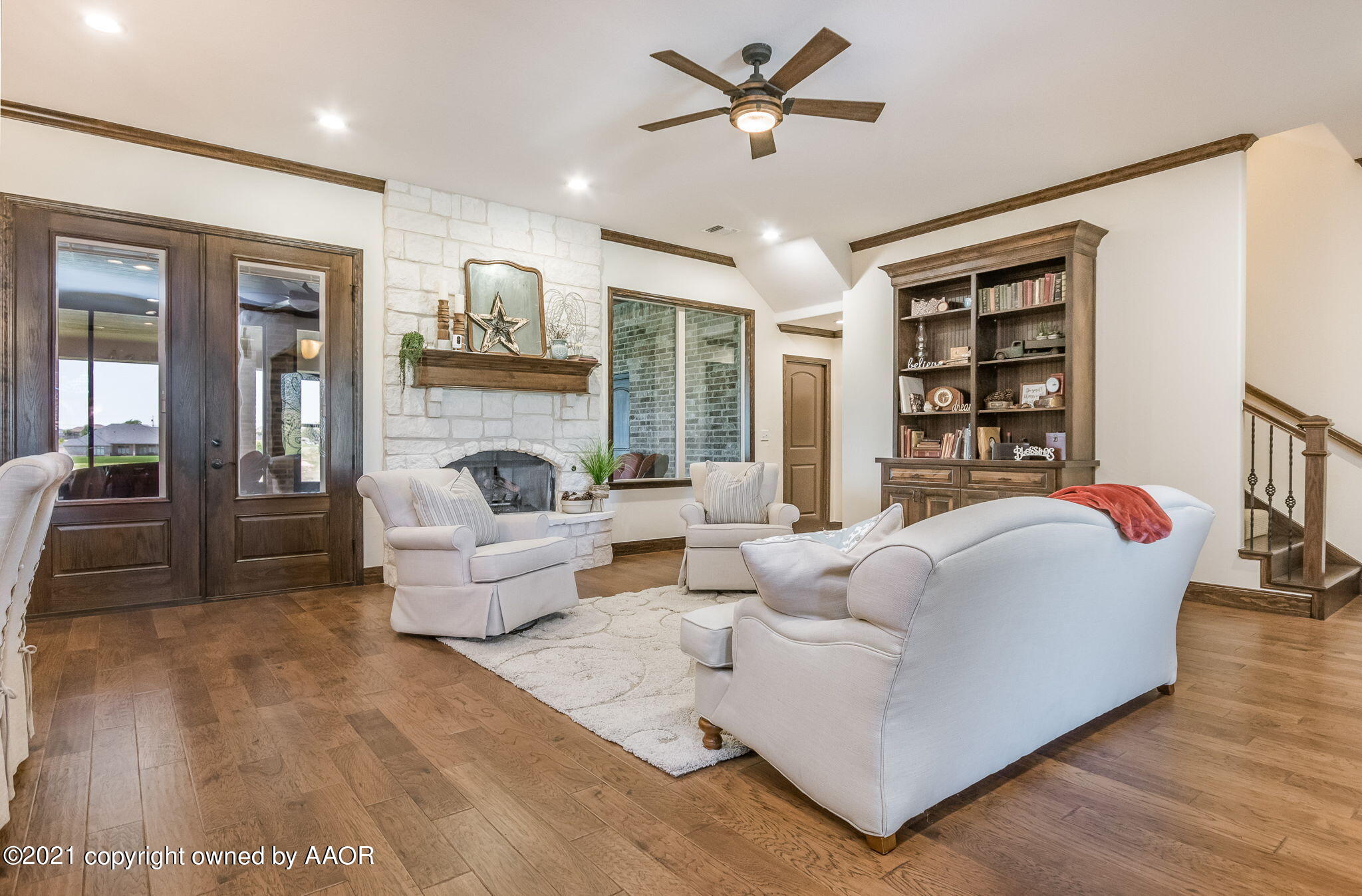 17500 Spring Lake Drive Canyon, TX 79015 - Photo 5 of 49 a living room with furniture and a fireplace