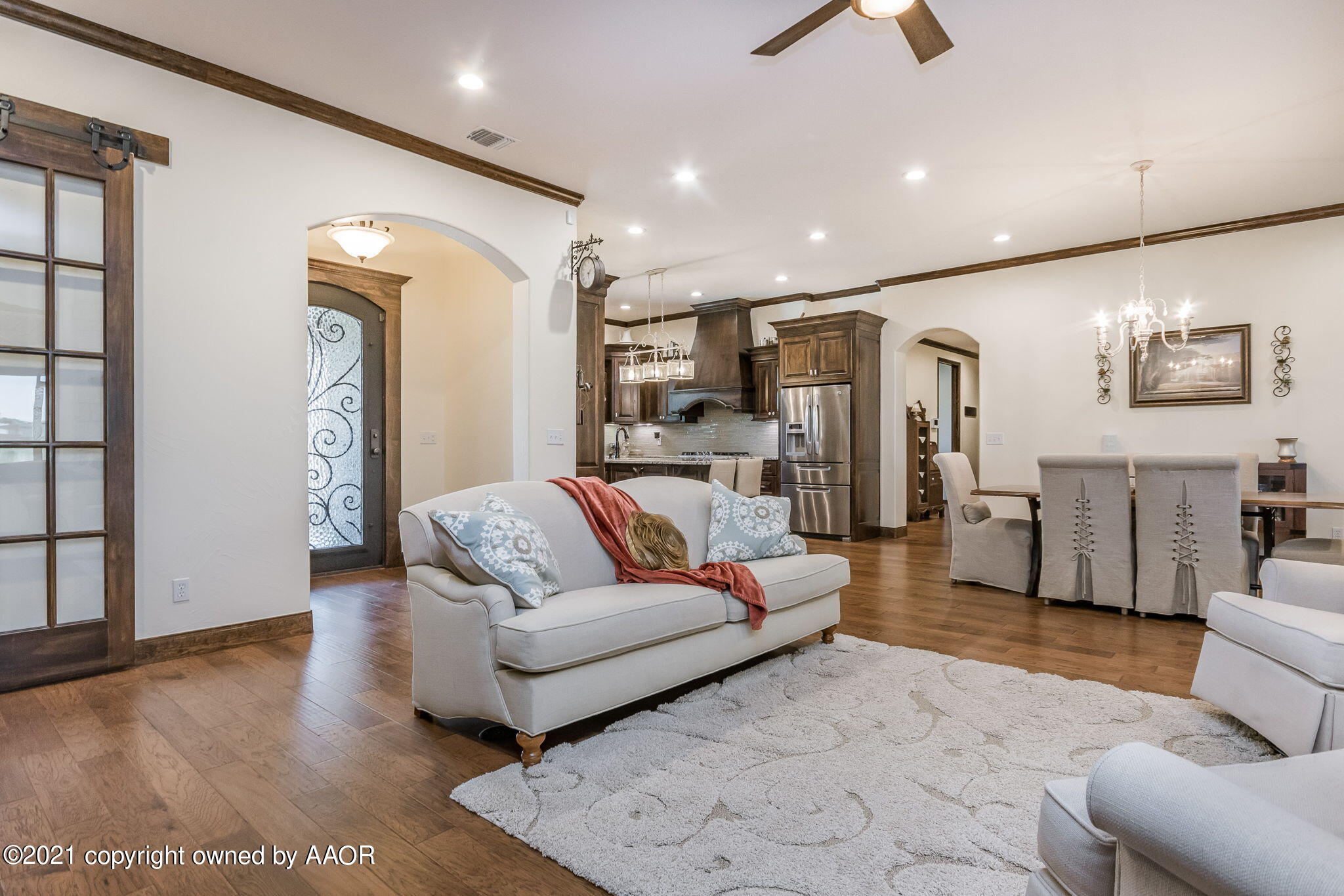 17500 Spring Lake Drive Canyon, TX 79015 - Photo 7 of 49 a living room with furniture and a flat screen tv