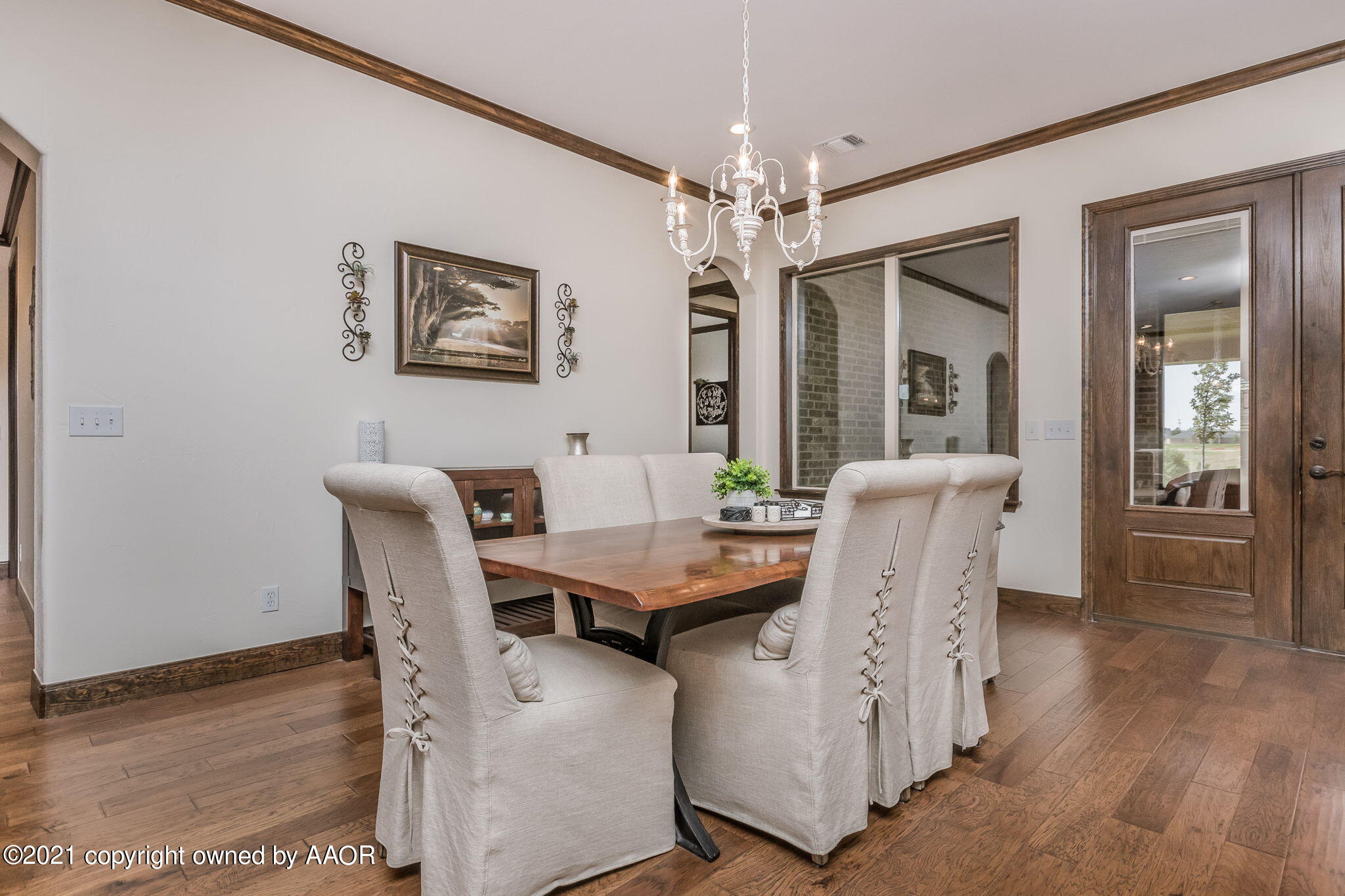 17500 Spring Lake Drive Canyon, TX 79015 - Photo 8 of 49 a view of a dining room with furniture and chandelier
