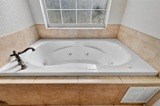 a bathroom with a bathtub