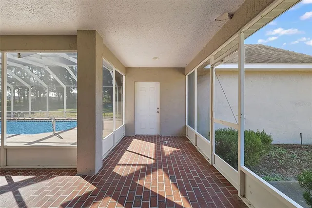 a view of a balcony with wooden floor