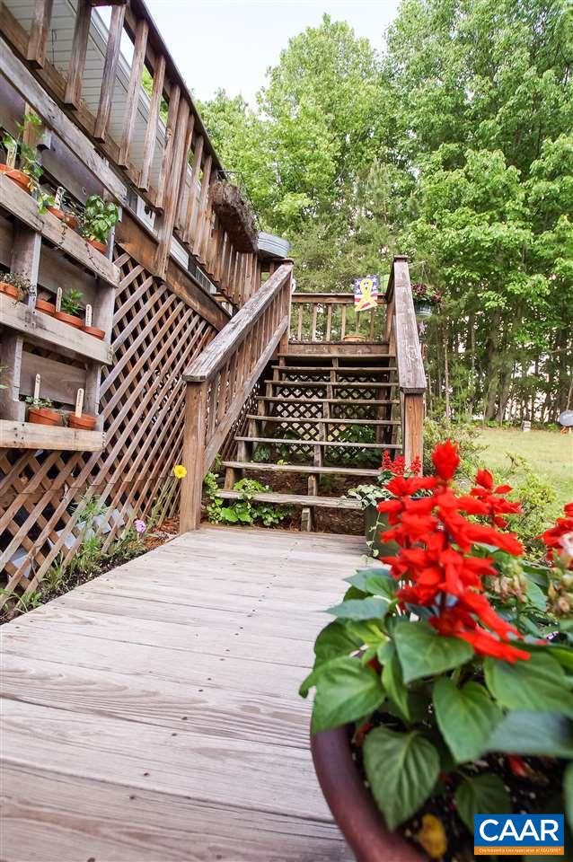 3075 Gold Mine Road Palmyra, VA 22963 - Photo 5 of 31 a backyard of a house with lots of green space