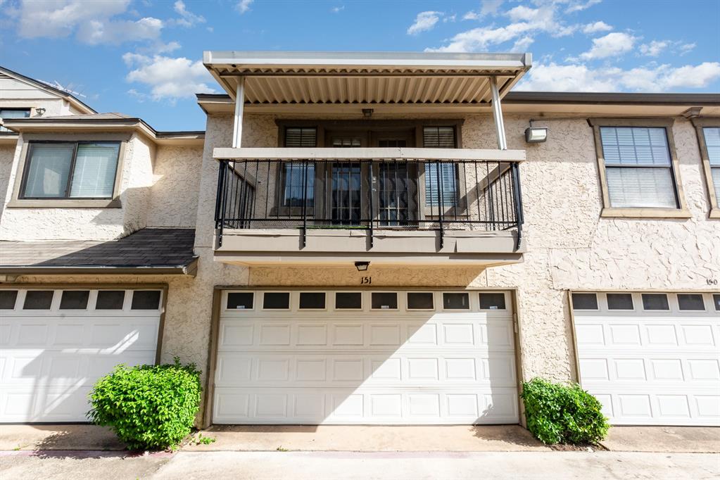 8750 Park Lane, Unit 151 Dallas, TX 75231 - Photo 2 of 33 a front view of a house