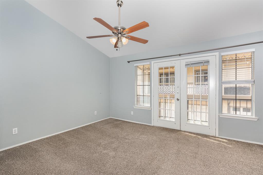 8750 Park Lane, Unit 151 Dallas, TX 75231 - Photo 25 of 33 a view of an empty room with a window