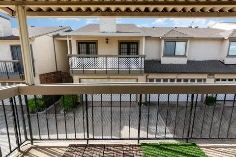 a front view of a house with a balcony