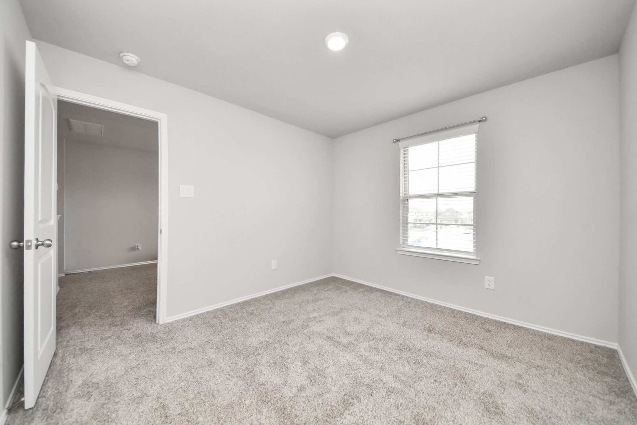 2347 Pettingell Way Spring Spring, TX 77373 - Photo 23 of 41 Bedroom with window view and ample floor space.