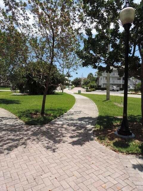20 Celestial Way, Unit 105 Juno Beach, FL 33408 - Photo 6 of 7 Path Around Pelican Lake
