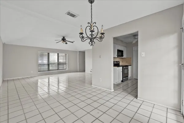 a view of an empty room and window