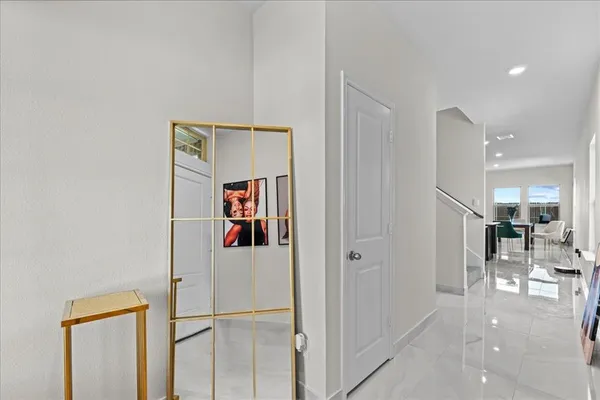 a view of a hallway with shelves