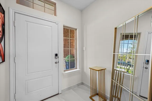 a view of a hallway with windows