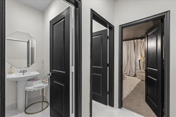 a bathroom with a sink and a mirror