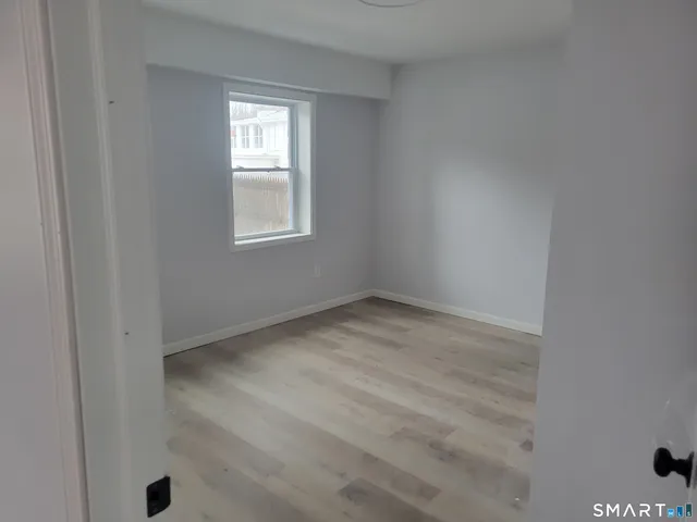 a view of empty room with a window