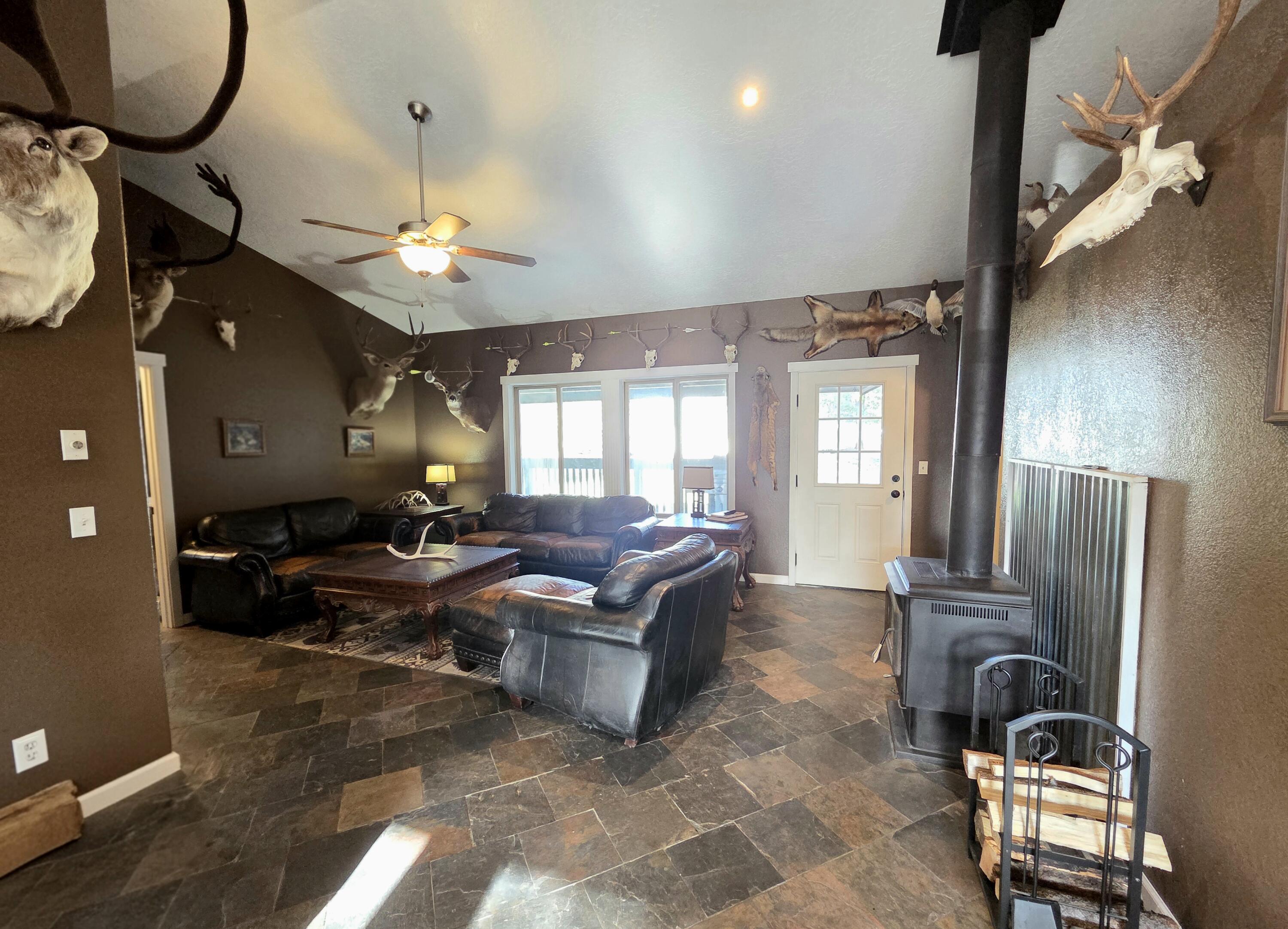 53156 Day Road La Pine, OR 97739 - Photo 13 of 28 view of the living space, with woodstove