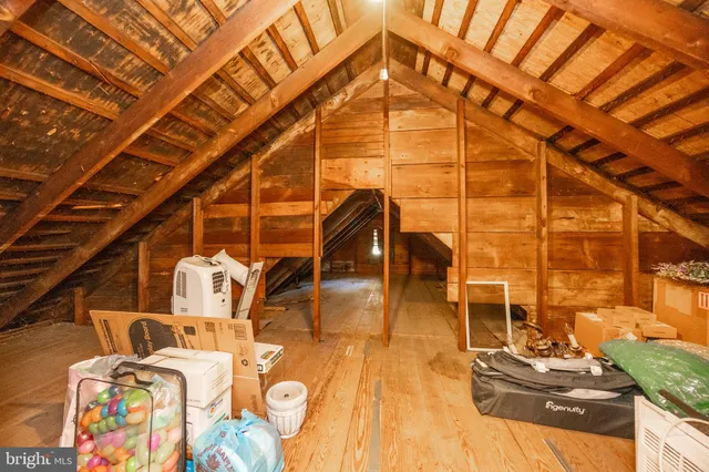a view of a gym with wooden floor