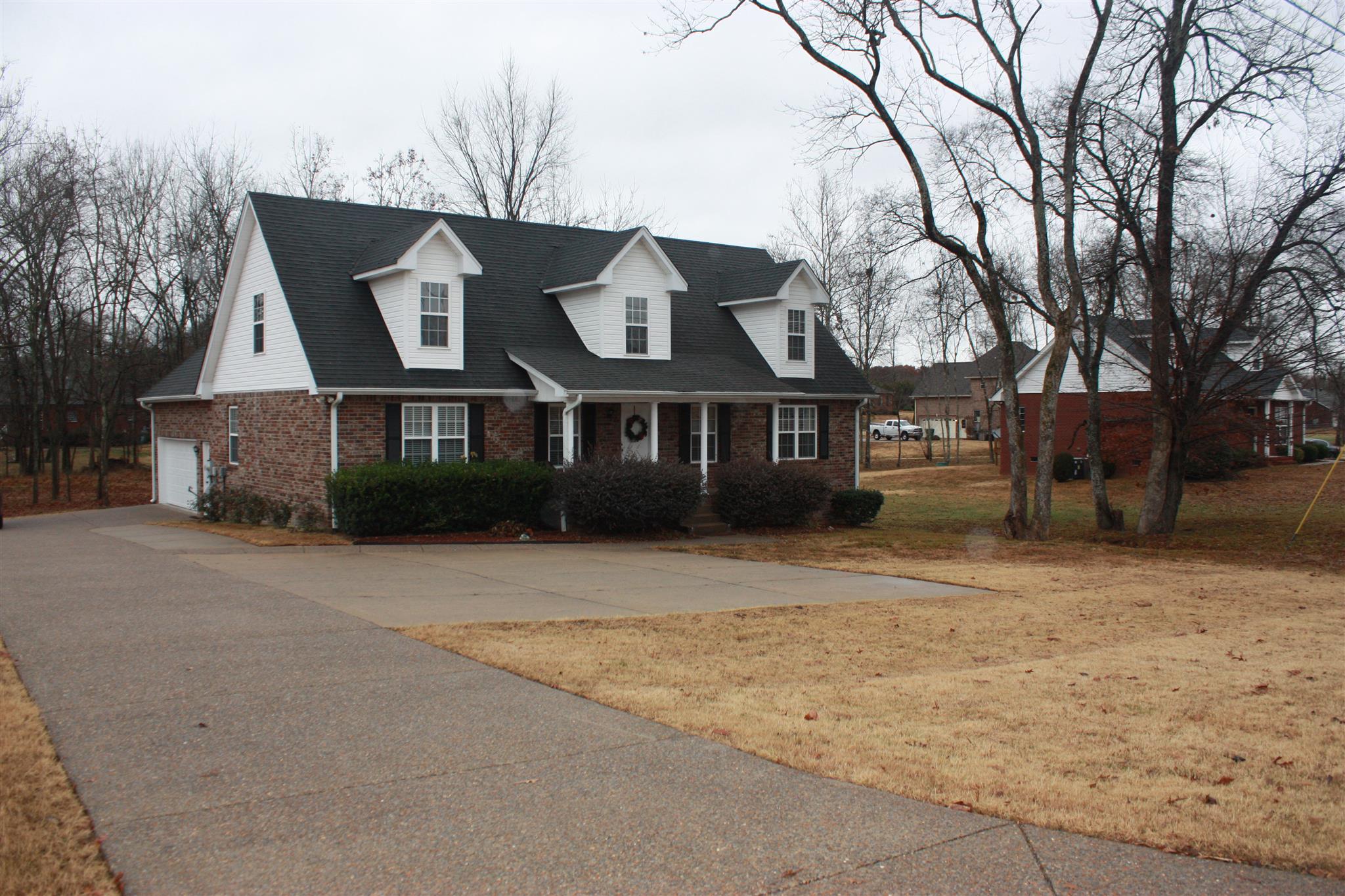 776 Cedar Grove Road Lebanon, TN 37087 - Photo 1 of 24 a front view of a house with a yard and garage