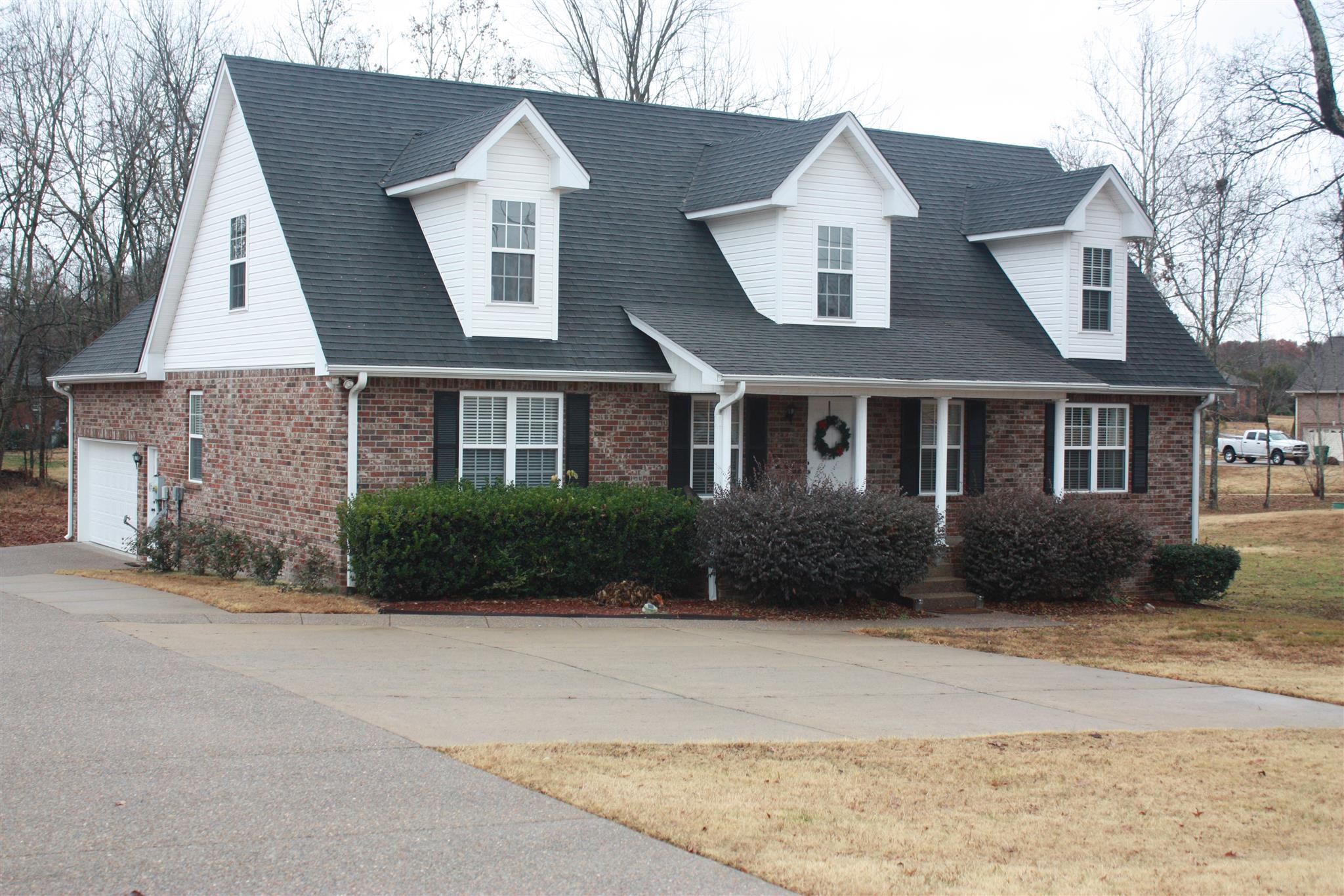 776 Cedar Grove Road Lebanon, TN 37087 - Photo 2 of 24 a front view of a house with a yard