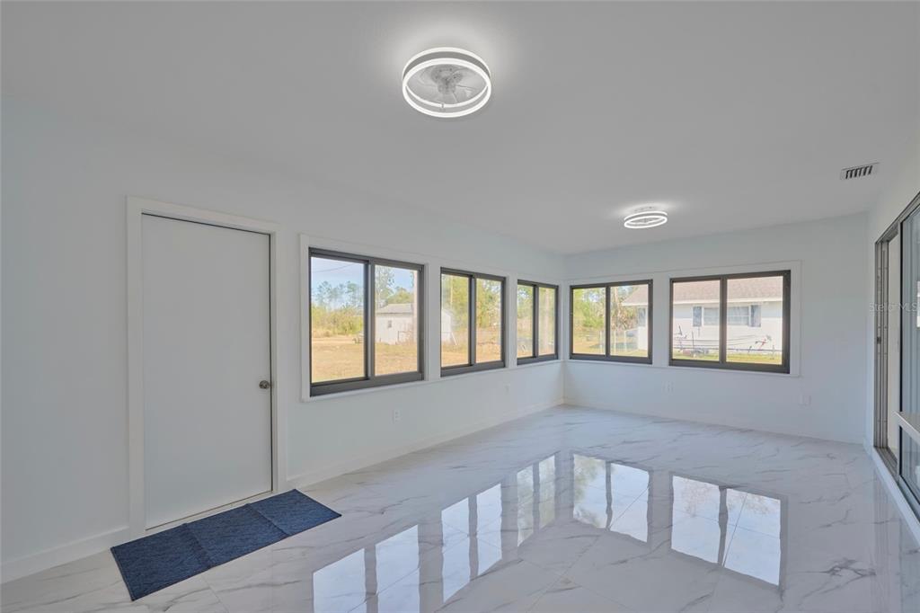 2310 Laguna Drive Indian Lake Estates, FL 33843 - Photo 13 of 27 a view of an empty room with a window
