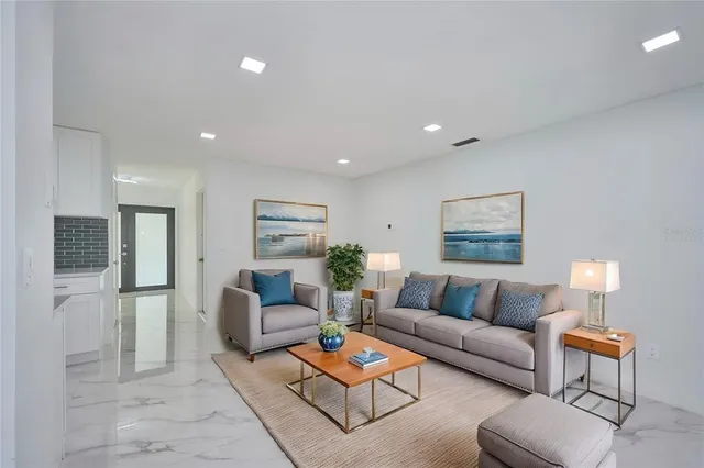 a living room with furniture and a couch