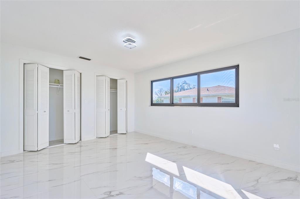 2310 Laguna Drive Indian Lake Estates, FL 33843 - Photo 21 of 27 a view of an empty room with a window
