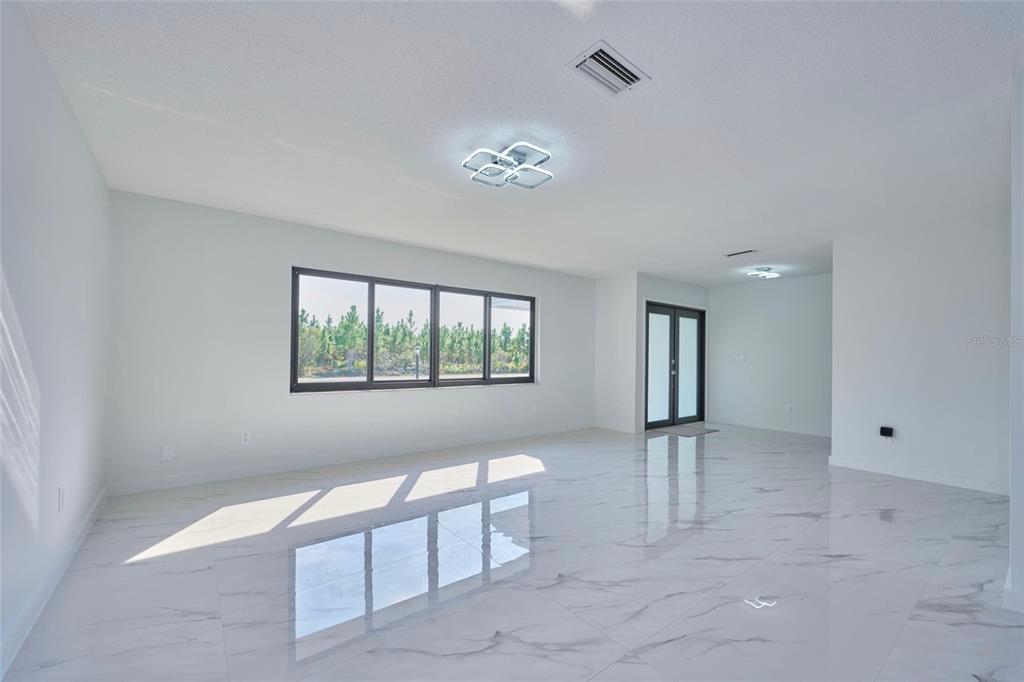 2310 Laguna Drive Indian Lake Estates, FL 33843 - Photo 4 of 27 a view of an empty room with a window