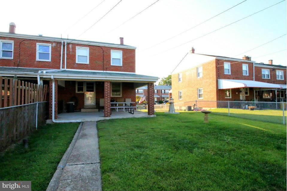 1711 Stokesley Road Baltimore, MD 21222 - Photo 27 of 30 a view of house with a yard