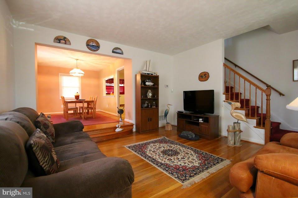 1711 Stokesley Road Baltimore, MD 21222 - Photo 4 of 30 a living room with furniture and a flat screen tv