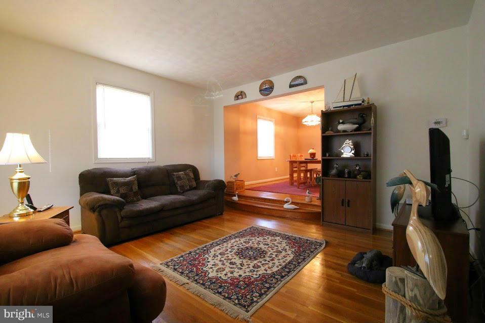 1711 Stokesley Road Baltimore, MD 21222 - Photo 5 of 30 a living room with furniture and a rug