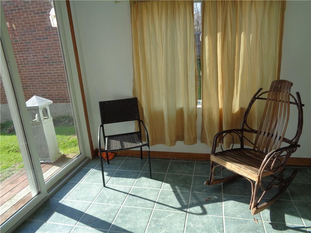 15 Ruth Street Roscoe, PA 15477 - Photo 12 of 14 ENCLOSED BACKPORCH
