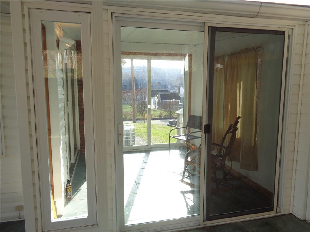 15 Ruth Street Roscoe, PA 15477 - Photo 13 of 14 ENCLOSED BACK PORCH