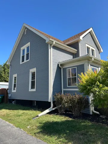 a house view with a garden space